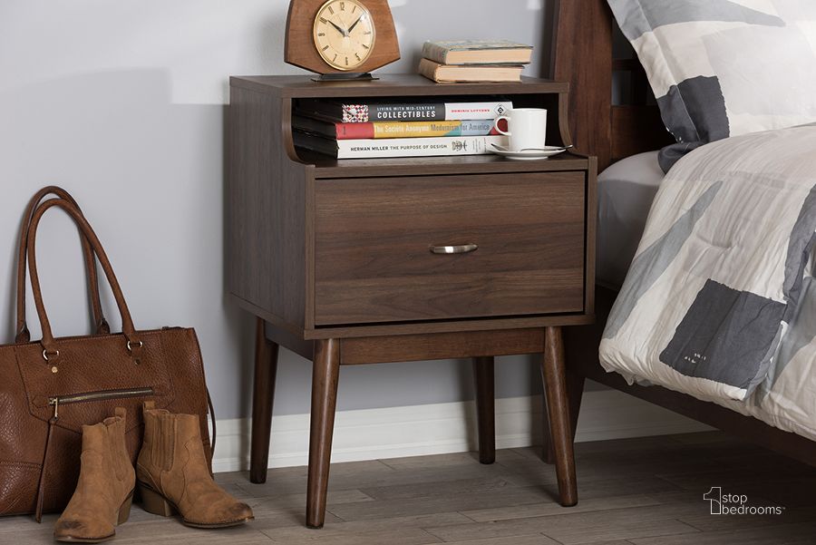The appearance of Baxton Studio Disa Mid-Century Modern Walnut Brown Finished Nightstand designed by Baxton Studio in the transitional interior design. This brown piece of furniture  was selected by 1StopBedrooms from Disa Collection to add a touch of cosiness and style into your home. Sku: ST 3748-00-Brown-NS. Product Type: Nightstand. Material: MDF. Image1