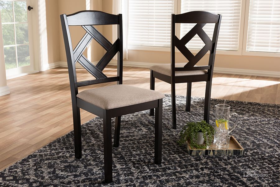 The appearance of Baxton Studio Ruth Modern And Contemporary Beige Fabric Upholstered And Dark Brown Finished Dining Chair (Set Of 2) designed by Baxton Studio in the modern / contemporary interior design. This beige piece of furniture  was selected by 1StopBedrooms from Ruth Collection to add a touch of cosiness and style into your home. Sku: RH133C-Dark Brown/Sand-DC. Material: Fabric. Product Type: Dining Chair. Image1