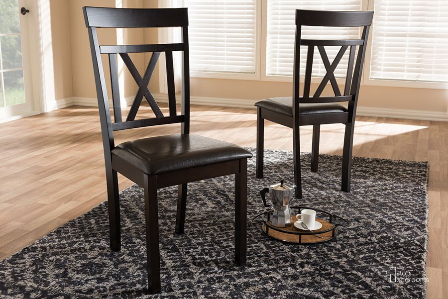 The appearance of Baxton Studio Rosie Modern And Contemporary Dark Brown Faux Leather Upholstered Dining Chair (Set Of 2) designed by Baxton Studio in the modern / contemporary interior design. This dark brown piece of furniture  was selected by 1StopBedrooms from Rosie Collection to add a touch of cosiness and style into your home. Sku: RH123C-Dark Brown-DC. Product Type: Dining Chair. Material: Rubberwood. Image1