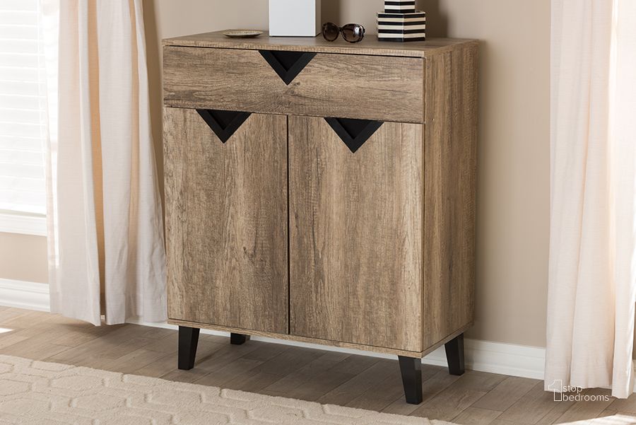 The appearance of Baxton Studio Wales Modern And Contemporary Light Brown Wood Shoe Storage Cabinet designed by Baxton Studio in the modern / contemporary interior design. This light brown piece of furniture  was selected by 1StopBedrooms from Wales Collection to add a touch of cosiness and style into your home. Sku: Wales-Cabinet. Product Type: Storage Trunk. Material: MDF. Image1