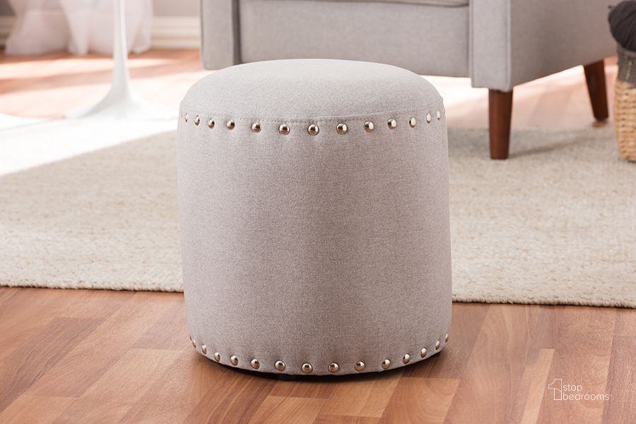 The appearance of Baxton Studio Rosine Modern And Contemporary Light Grey Fabric Upholstered Nail Trim Ottoman designed by Baxton Studio in the modern / contemporary interior design. This light grey piece of furniture  was selected by 1StopBedrooms from Rosine Collection to add a touch of cosiness and style into your home. Sku: 1708-Light Gray. Material: Fabric. Product Type: Ottoman. Image1