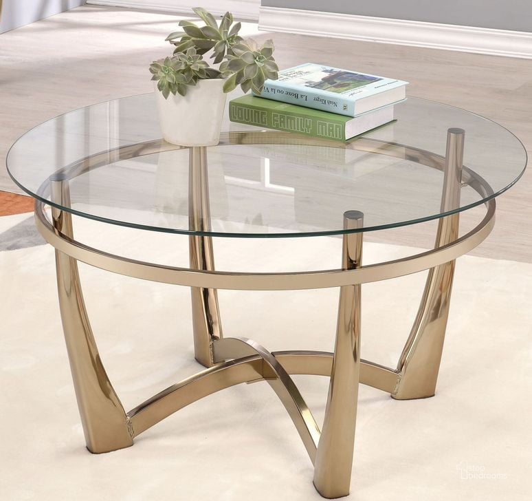 The appearance of Orlando Ii Champagne and Clear Glass Coffee Table designed by ACME in the transitional interior design. This gold piece of furniture  was selected by 1StopBedrooms from Orlando Ii Collection to add a touch of cosiness and style into your home. Sku: 81610. Material: Metal. Product Type: Coffee Table. Image1