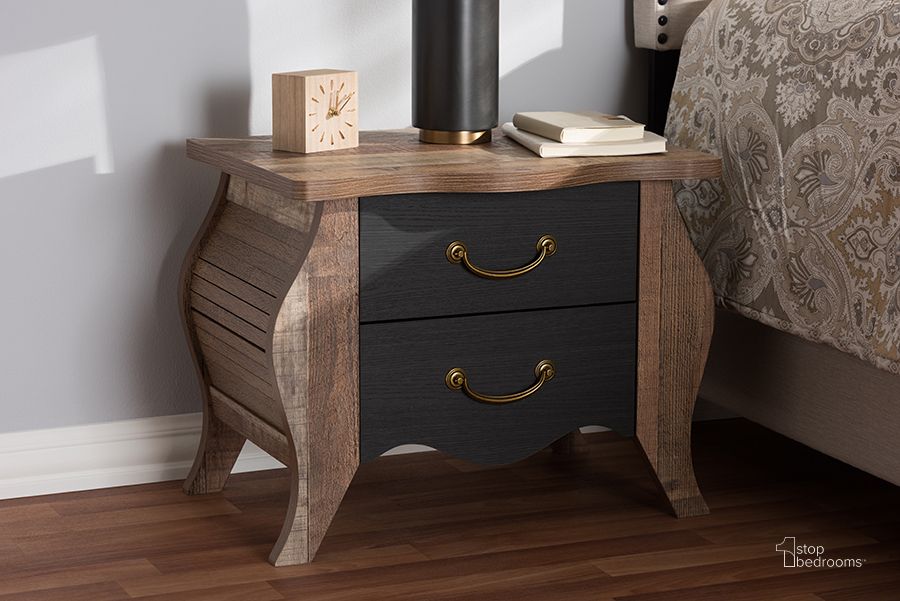 The appearance of Baxton Studio Romilly Country Cottage Farmhouse Black And Oak-Finished Wood 2-Drawer Nightstand designed by Baxton Studio in the country / farmhouse interior design. This black piece of furniture  was selected by 1StopBedrooms from Romilly Collection to add a touch of cosiness and style into your home. Sku: BR990063-Black/Oak-2DW-NS. Product Type: Nightstand. Material: MDF. Image1