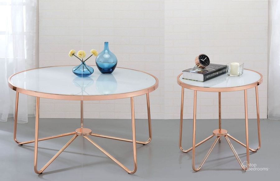 The appearance of Alivia Rose Gold and Frosted Glass Occasional Table Set designed by ACME in the modern / contemporary interior design. This gold piece of furniture  was selected by 1StopBedrooms from Alivia Collection to add a touch of cosiness and style into your home. Sku: 81835;81837. Table Top Shape: Round. Material: Glass. Product Type: Occasional Table Set. Image1