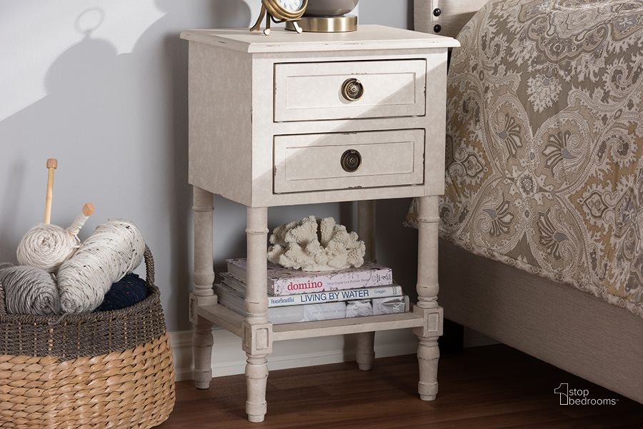 The appearance of Baxton Studio Lenore Country Cottage Farmhouse Whitewashed 2-Drawer Nightstand designed by Baxton Studio in the country / farmhouse interior design. This white piece of furniture  was selected by 1StopBedrooms from Lenore Collection to add a touch of cosiness and style into your home. Sku: RAM55-Whitewashed-NS. Material: Wood. Product Type: Nightstand. Image1