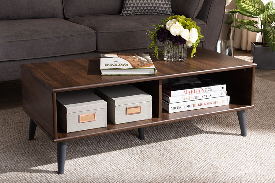 The appearance of Baxton Studio Pierre Mid-Century Modern Brown And Dark Grey Finished Wood Coffee Table designed by Baxton Studio in the transitional interior design. This walnut piece of furniture  was selected by 1StopBedrooms from Pierre Collection to add a touch of cosiness and style into your home. Sku: SECFT3001-Columbia Brown/Dark Grey-CT. Product Type: Coffee Table. Material: MDF. Image1