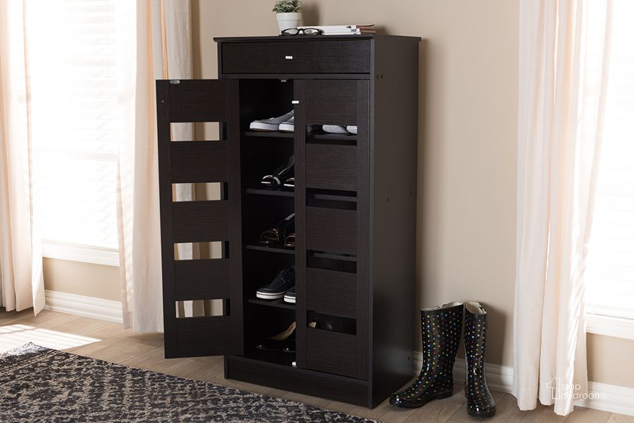 The appearance of Baxton Studio Acadia Modern And Contemporary Wenge Brown Finished Shoe Cabinet designed by Baxton Studio in the modern / contemporary interior design. This dark brown piece of furniture  was selected by 1StopBedrooms from Acadia Collection to add a touch of cosiness and style into your home. Sku: MH27202-Wenge-Shoe Rack. Material: MDF. Product Type: Shoe Cabinet. Image1