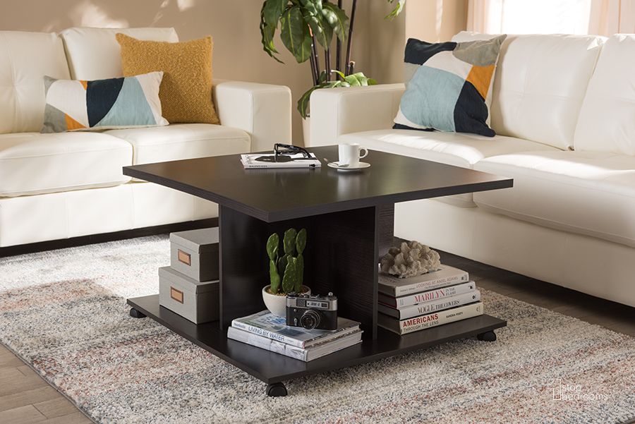 The appearance of Baxton Studio Cladine Modern And Contemporary Wenge Brown Finished Coffee Table designed by Baxton Studio in the modern / contemporary interior design. This dark brown piece of furniture  was selected by 1StopBedrooms from Cladine Collection to add a touch of cosiness and style into your home. Sku: MH22003-Wenge-CT. Product Type: Coffee Table. Material: MDF. Image1