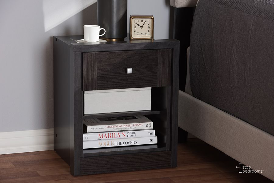 The appearance of Baxton Studio Danette Modern And Contemporary Wenge Brown Finished 1-Drawer Nightstand designed by Baxton Studio in the modern / contemporary interior design. This dark brown piece of furniture  was selected by 1StopBedrooms from Danette Collection to add a touch of cosiness and style into your home. Sku: MH5052-Wenge-NS. Product Type: Nightstand. Material: MDF. Image1