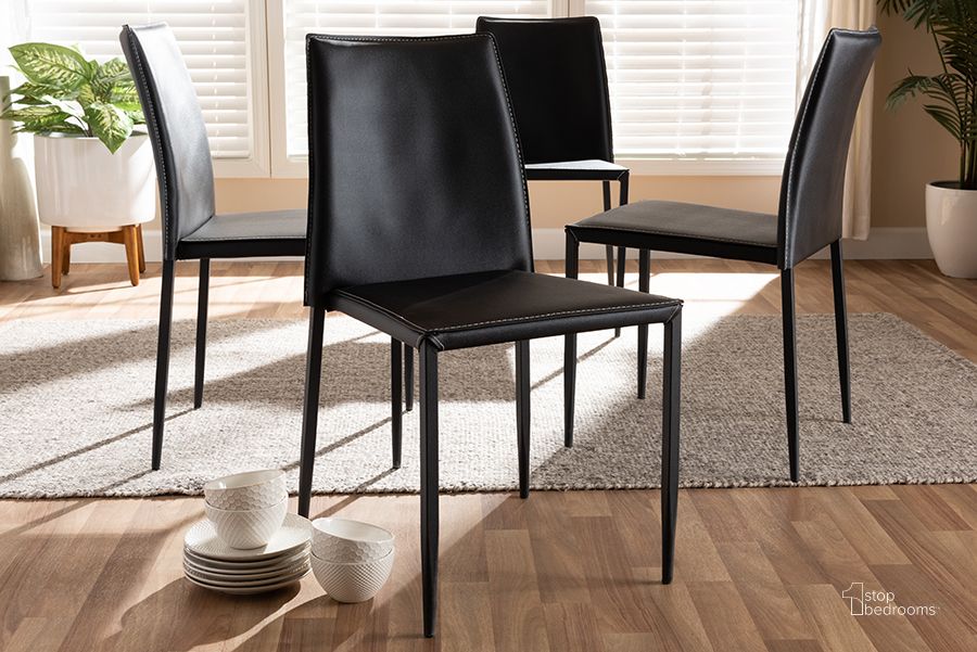 The appearance of Baxton Studio Pascha Modern And Contemporary Black Faux Leather Upholstered Dining Chair (Set Of 4) designed by Baxton Studio in the modern / contemporary interior design. This black piece of furniture  was selected by 1StopBedrooms from Pascha Collection to add a touch of cosiness and style into your home. Sku: 150543-Black. Product Type: Dining Chair. Material: MDF. Image1