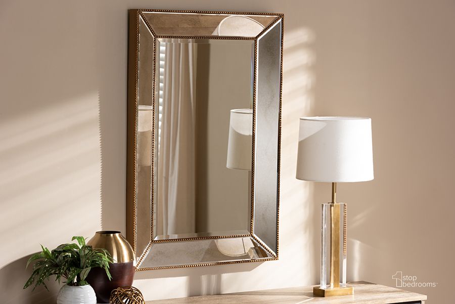 The appearance of Baxton Studio Neva Modern And Contemporary Antique Gold Finished Rectangular Accent Wall Mirror designed by Baxton Studio in the modern / contemporary interior design. This antique gold piece of furniture  was selected by 1StopBedrooms from Neva Collection to add a touch of cosiness and style into your home. Sku: RXW-6177. Material: MDF. Product Type: Accent Mirror. Image1
