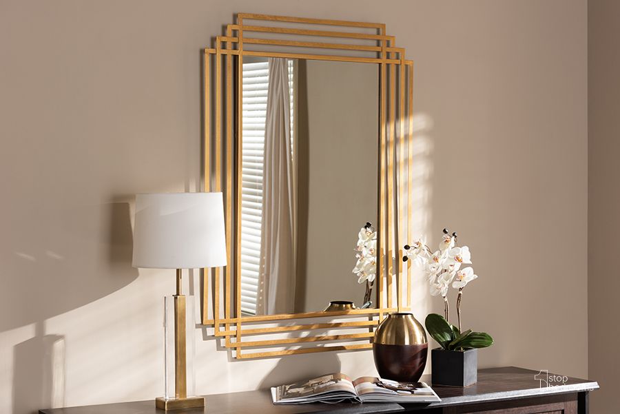 The appearance of Baxton Studio Kalinda Art Deco Antique Gold Finished Rectangular Accent Wall Mirror designed by Baxton Studio in the traditional interior design. This antique gold piece of furniture  was selected by 1StopBedrooms from Kalinda Collection to add a touch of cosiness and style into your home. Sku: RXW-6233. Material: Metal. Product Type: Accent Mirror. Image1