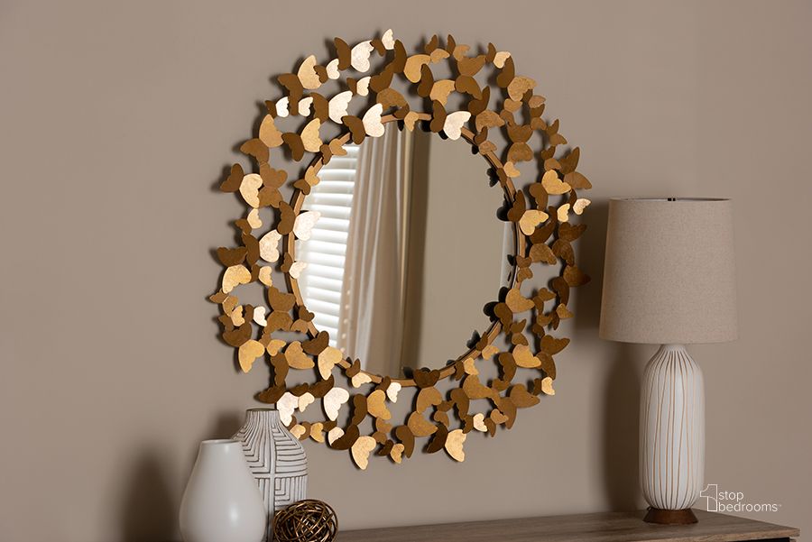 The appearance of Baxton Studio Soleil Modern And Contemporary Antique Gold Finished Butterfly Accent Wall Mirror designed by Baxton Studio in the modern / contemporary interior design. This antique gold piece of furniture  was selected by 1StopBedrooms from Soleil Collection to add a touch of cosiness and style into your home. Sku: RXW-6159. Material: Metal. Product Type: Accent Mirror. Image1