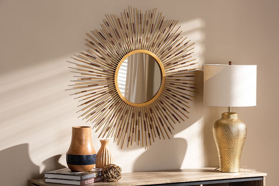 The appearance of Baxton Studio Apollonia Modern And Contemporary Gold Finished Sunburst Accent Wall Mirror designed by Baxton Studio in the modern / contemporary interior design. This gold piece of furniture  was selected by 1StopBedrooms from Apollonia Collection to add a touch of cosiness and style into your home. Sku: RTB1254. Material: Metal. Product Type: Accent Mirror. Image1