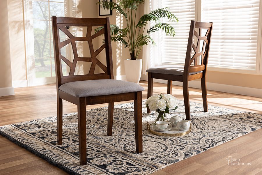 The appearance of Baxton Studio Abilene Mid-Century Grey Fabric Upholstered And Walnut Brown Finished Dining Chair Set Of 2 designed by Baxton Studio in the transitional interior design. This grey piece of furniture  was selected by 1StopBedrooms from Abilene Collection to add a touch of cosiness and style into your home. Sku: RH3010C-Walnut/Grey-DC. Material: Fabric. Product Type: Dining Chair. Image1