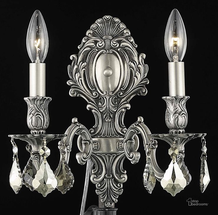 The appearance of Monarch 10 Pewter 2 Light Wall Sconce With Golden Teak Royal Cut Crystal Trim designed by Elegant Lighting in the glam interior design. This silver piece of furniture  was selected by 1StopBedrooms from Monarch Collection to add a touch of cosiness and style into your home. Sku: 9602W10PW-GT/RC. Product Type: Wall Sconce. Material: Crystal.