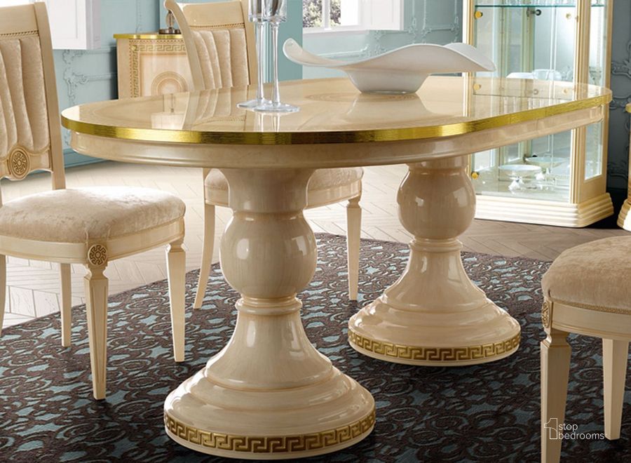 The appearance of Aida Dining Table (Ivory and Gold) designed by ESF in the traditional interior design. This gold piece of furniture  was selected by 1StopBedrooms from Aida Collection to add a touch of cosiness and style into your home. Sku: AIDATABLEIVORY. Table Base Style: Double Pedestal. Table Top Shape: Oval. Product Type: Dining Table. Material: MDF.