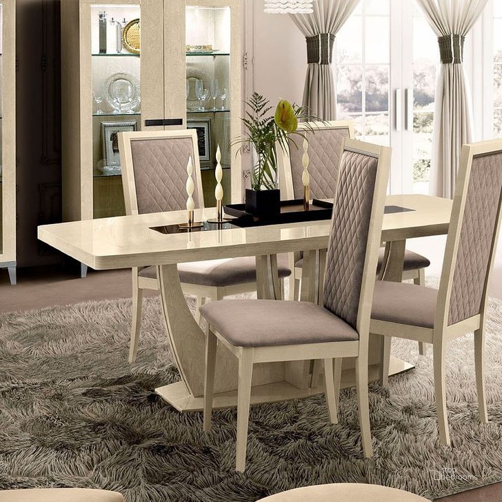 The appearance of Ambra Dining Room Set designed by ESF in the modern / contemporary interior design. This ivory piece of furniture  was selected by 1StopBedrooms from Ambra Collection to add a touch of cosiness and style into your home. Sku: AMBRATABLE;AMBRASIDECHAIR. Table Base Style: Pedestal. Product Type: Dining Room Set. Material: MDF. Table Top Shape: Rectangular. Size: 79". Image1
