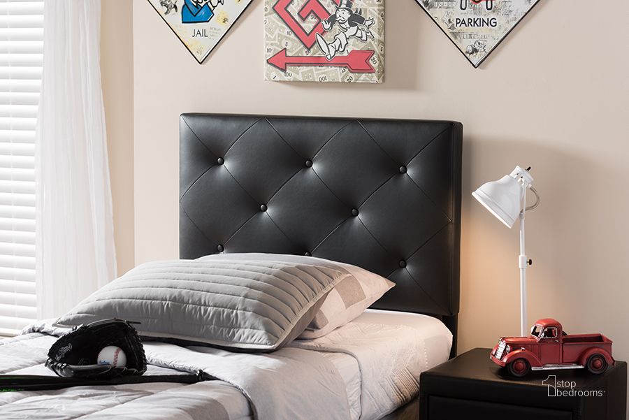 The appearance of Baxton Studio Baltimore Modern And Contemporary Black Faux Leather Upholstered Twin Size Headboard designed by Baxton Studio in the modern / contemporary interior design. This black piece of furniture  was selected by 1StopBedrooms from Baltimore Collection to add a touch of cosiness and style into your home. Sku: BBT6431-Black-Twin HB. Product Type: Headboard. Bed Size: Twin. Material: Rubberwood. Image1
