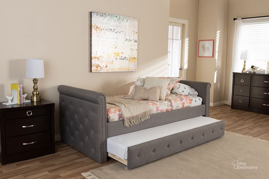 The appearance of Baxton Studio Swamson Modern And Contemporary Grey Fabric Tufted Twin Size Daybed With Roll-Out Trundle Guest Bed designed by Baxton Studio in the modern / contemporary interior design. This grey piece of furniture  was selected by 1StopBedrooms from Swamson Collection to add a touch of cosiness and style into your home. Sku: BBT6576T-Grey-Twin. Bed Type: Daybed. Material: Fabric. Product Type: DayBed. Bed Size: Twin. Image1