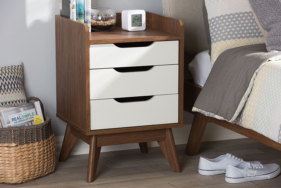 The appearance of Baxton Studio Brighton Mid-Century Modern White And Walnut Wood 3-Drawer Storage Nightstand designed by Baxton Studio in the transitional interior design. This white piece of furniture  was selected by 1StopBedrooms from Brighton Collection to add a touch of cosiness and style into your home. Sku: Brighton-Walnut/White-NS. Product Type: Nightstand. Material: MDF. Image1