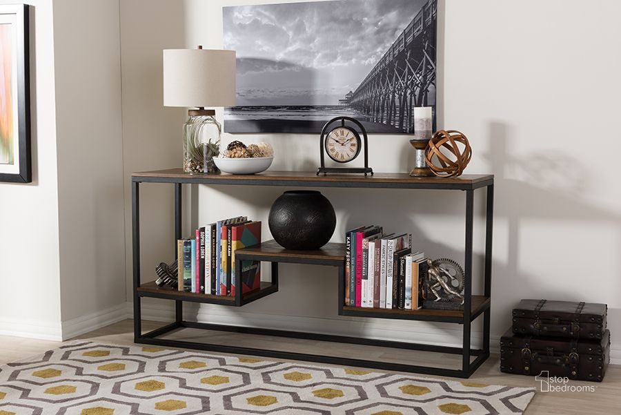 The appearance of Baxton Studio Doreen Rustic Industrial Style Antique Black Textured Finished Metal Distressed Wood Console Table designed by Baxton Studio in the industrial interior design. This brown piece of furniture  was selected by 1StopBedrooms from Doreen Collection to add a touch of cosiness and style into your home. Sku: CA-1113 (YLX-2677). Product Type: Console Table. Material: MDF. Image1