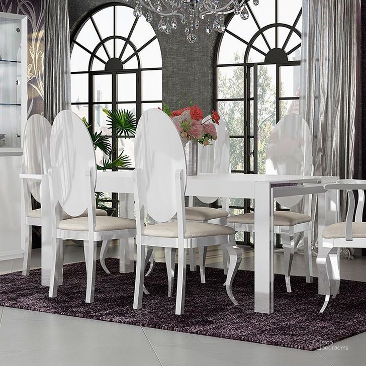 The appearance of Carmen Dining Table (White) designed by ESF in the modern / contemporary interior design. This white high gloss piece of furniture  was selected by 1StopBedrooms from Carmen Collection to add a touch of cosiness and style into your home. Sku: CARMENTABLEWHITE. Table Base Style: Legs. Product Type: Dining Table. Material: MDF. Table Top Shape: Rectangular. Size: 63". Image1