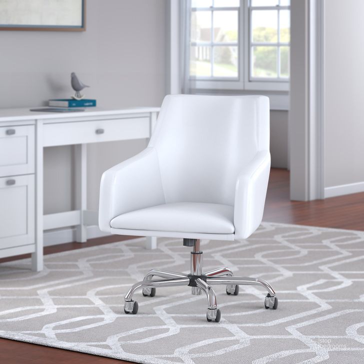 The appearance of London Mid Back Leather Box Chair in White designed by Bush Furniture in the modern / contemporary interior design. This white piece of furniture  was selected by 1StopBedrooms from London Collection to add a touch of cosiness and style into your home. Sku: CH2401WHL-03. Product Type: Office Chair. Image1