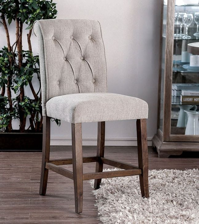 The appearance of Sania III Counter Height Chair (Rustic Oak) (Set of 2) designed by Furniture of America in the traditional interior design. This beige piece of furniture  was selected by 1StopBedrooms from Sania Collection to add a touch of cosiness and style into your home. Sku: CM3564A-PC-2PK. Material: Fabric. Product Type: Counter Height Chair.