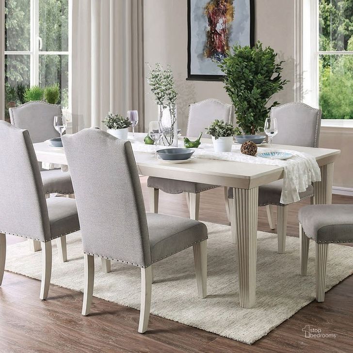 The appearance of Daniella Dining Table designed by Furniture of America in the transitional interior design. This antique white piece of furniture  was selected by 1StopBedrooms from Daniella Collection to add a touch of cosiness and style into your home. Sku: CM3630T. Table Base Style: Legs. Material: Wood. Product Type: Dining Table. Table Top Shape: Rectangular. Size: 42". Image1