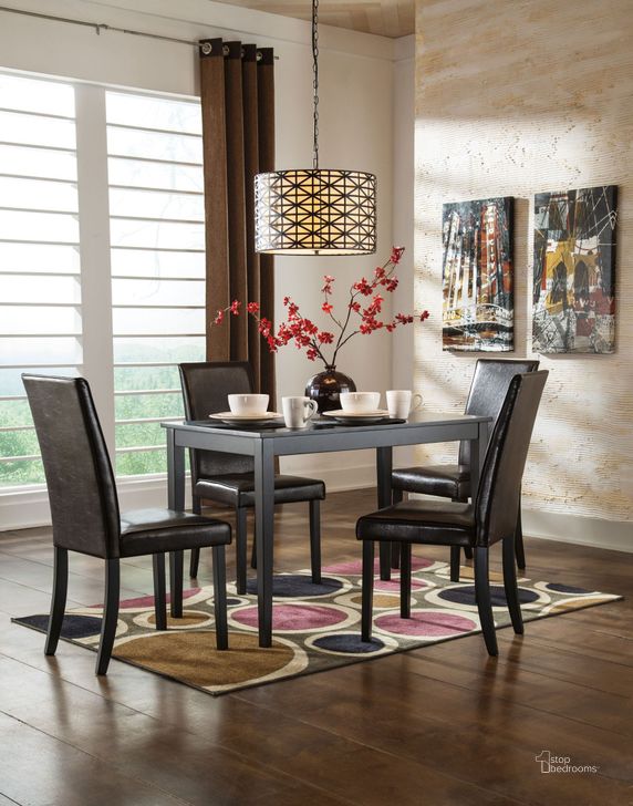The appearance of Kimonte Rectangular Dining Room Set designed by Signature Design by Ashley in the modern / contemporary interior design. This dark brown piece of furniture  was selected by 1StopBedrooms from Kimonte Collection to add a touch of cosiness and style into your home. Sku: D250-25;D250-01. Table Base Style: Legs. Material: Wood. Product Type: Dining Room Set. Table Top Shape: Rectangular. Image1