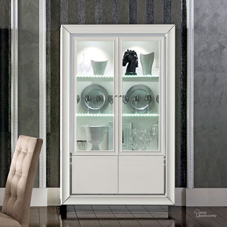 The appearance of Dama Bianca 2 Door China designed by ESF in the modern / contemporary interior design. This white high gloss piece of furniture  was selected by 1StopBedrooms from Dama Bianca Collection to add a touch of cosiness and style into your home. Sku: DAMABIANCA2DCHINA. Material: MDF. Product Type: China Cabinets and Curio. Image1