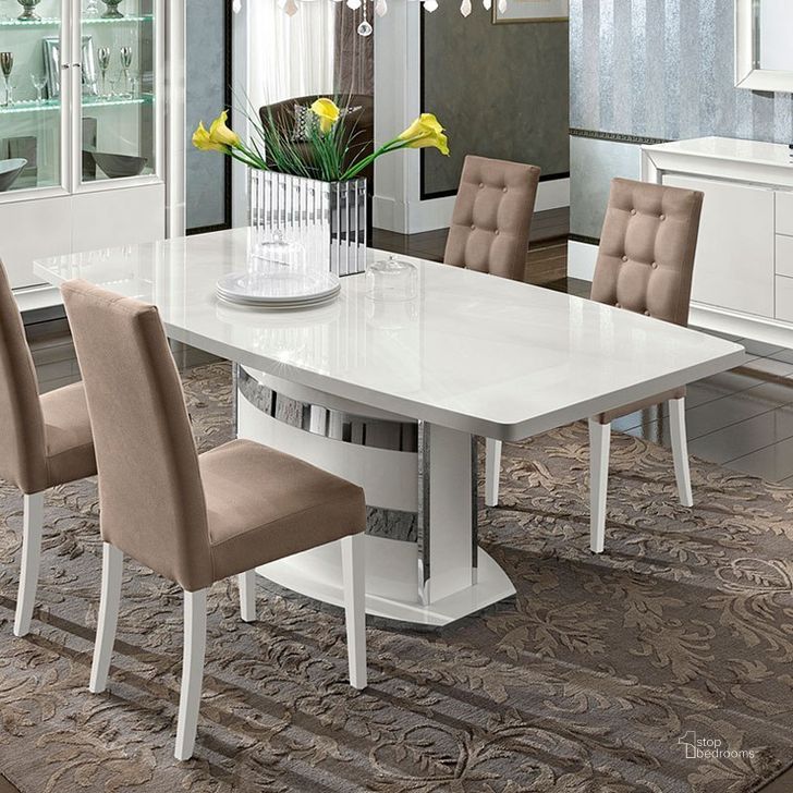 The appearance of Dama Bianca Dining Table designed by ESF in the modern / contemporary interior design. This white high gloss piece of furniture  was selected by 1StopBedrooms from Dama Bianca Collection to add a touch of cosiness and style into your home. Sku: DAMABIANCADTABLE. Table Base Style: Pedestal. Product Type: Dining Table. Material: MDF. Table Top Shape: Rectangular. Size: 79.