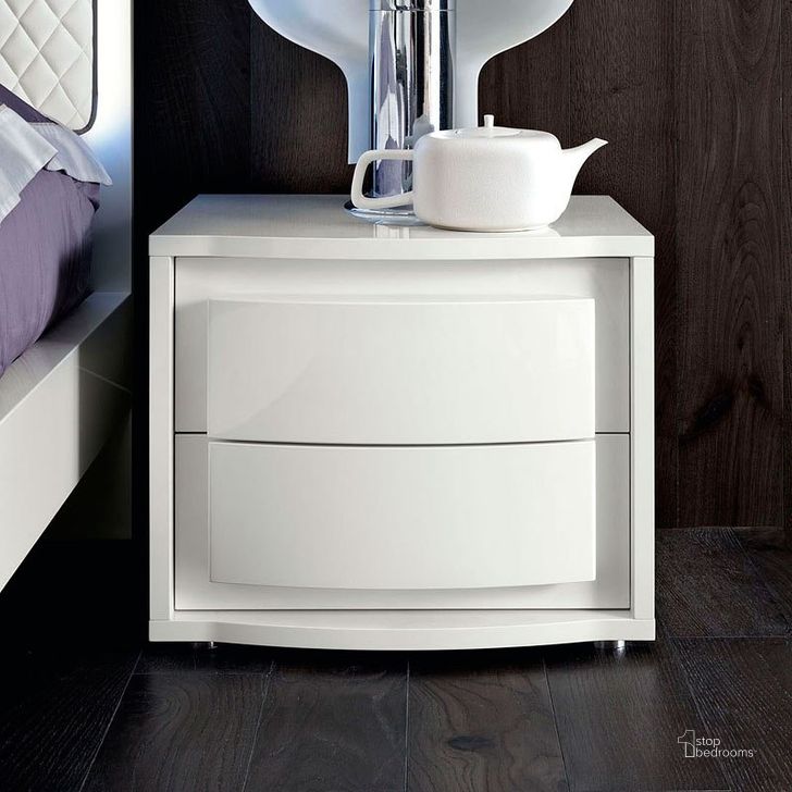 The appearance of Dama Bianca Nightstand designed by ESF in the modern / contemporary interior design. This white high gloss piece of furniture  was selected by 1StopBedrooms from Dama Bianca Collection to add a touch of cosiness and style into your home. Sku: DAMABIANCANS. Product Type: Nightstand. Material: MDF. Image1
