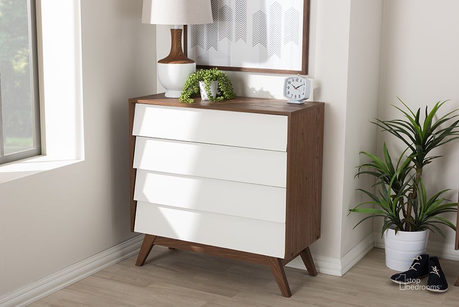 The appearance of Baxton Studio Hildon Mid-Century Modern White And Walnut Wood 4-Drawer Storage Chest designed by Baxton Studio in the transitional interior design. This white piece of furniture  was selected by 1StopBedrooms from Hildon Collection to add a touch of cosiness and style into your home. Sku: Hildon 4DW-Walnut/White-Chest. Product Type: Chest. Material: MDF. Image1