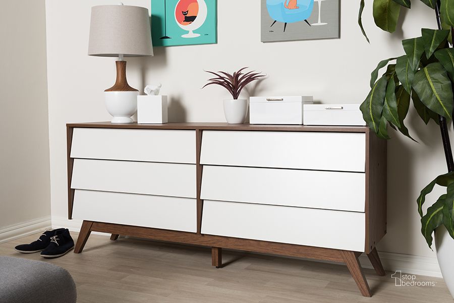 The appearance of Baxton Studio Hildon Mid-Century Modern White And Walnut Wood 6-Drawer Storage Dresser designed by Baxton Studio in the transitional interior design. This white piece of furniture  was selected by 1StopBedrooms from Hildon Collection to add a touch of cosiness and style into your home. Sku: Hildon 6DW-Walnut/White-Chest. Product Type: Chest. Material: MDF. Image1