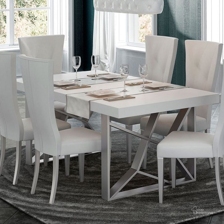 The appearance of Kiu Dining Table designed by ESF in the modern / contemporary interior design. This white high gloss piece of furniture  was selected by 1StopBedrooms from Kiu Collection to add a touch of cosiness and style into your home. Sku: KIUDININGTABLE. Table Base Style: Double Pedestal. Product Type: Dining Table. Material: MDF. Table Top Shape: Rectangular. Size: 79.
