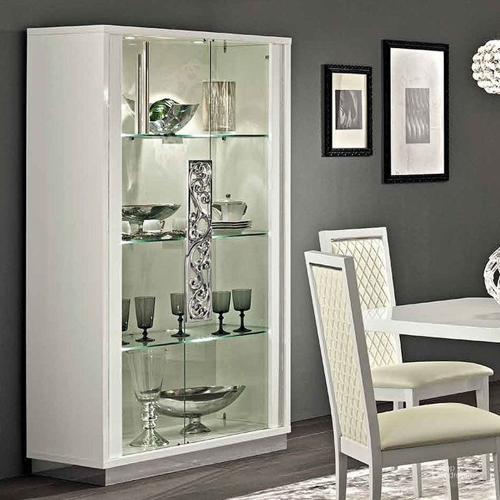 The appearance of Roma 2 Door Curio (White) designed by ESF in the modern / contemporary interior design. This white piece of furniture  was selected by 1StopBedrooms from Roma Collection to add a touch of cosiness and style into your home. Sku: ROMA2DOORCHINAWHITE. Material: MDF. Product Type: China Cabinets and Curio. Image1