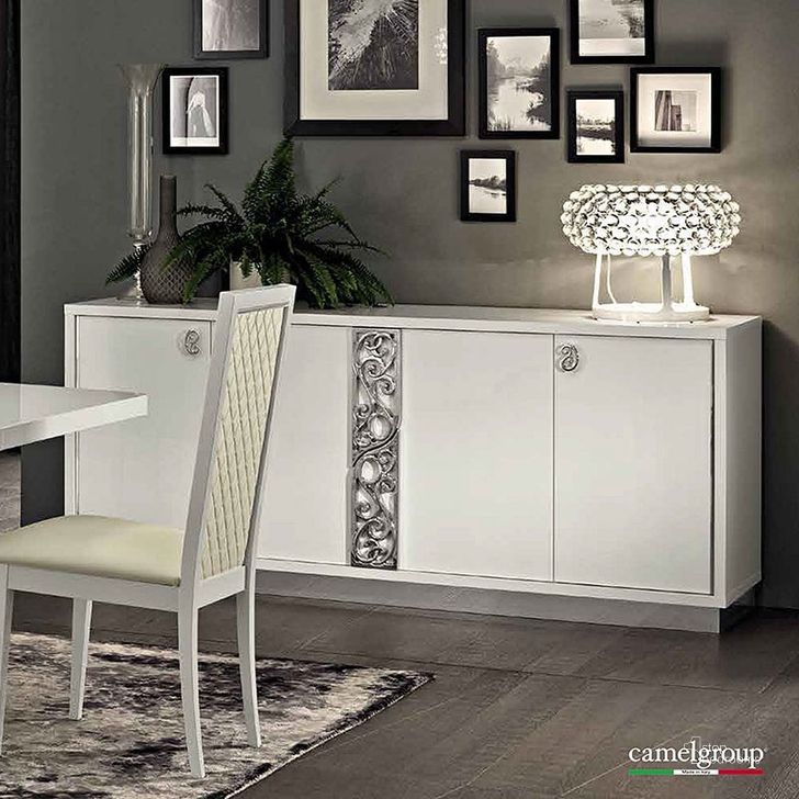 The appearance of Roma 4 Door Buffet (White) designed by ESF in the modern / contemporary interior design. This white piece of furniture  was selected by 1StopBedrooms from Roma Collection to add a touch of cosiness and style into your home. Sku: ROMA4DBUFFETWHITE. Material: MDF. Product Type: Buffets, Sideboards and Server. Image1