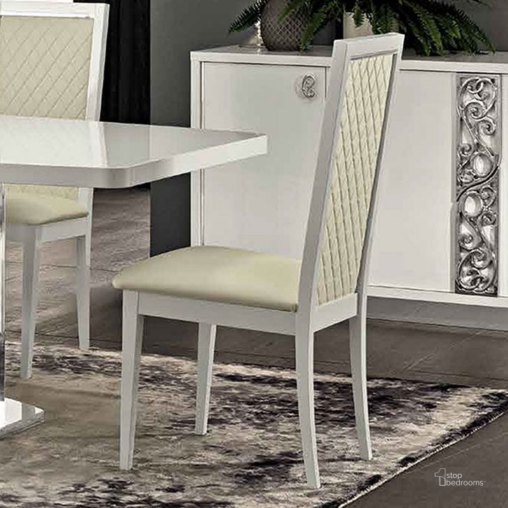 The appearance of Roma Chair (White) (Set of 2) designed by ESF in the modern / contemporary interior design. This white piece of furniture  was selected by 1StopBedrooms from Roma Collection to add a touch of cosiness and style into your home. Sku: ROMACHAIRWHITE. Product Type: Dining Chair. Material: MDF.