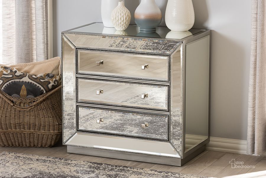 The appearance of Baxton Studio Edeline Hollywood Regency Glamour Style Mirrored 3-Drawer Cabinet designed by Baxton Studio in the glam interior design. This silver piece of furniture  was selected by 1StopBedrooms from Edeline Collection to add a touch of cosiness and style into your home. Sku: RXF-679. Product Type: Storage Cabinet. Material: MDF. Image1