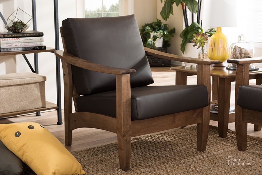 The appearance of Baxton Studio Pierce Mid-Century Modern Walnut Brown Wood And Dark Brown Faux Leather 1-Seater Lounge Chair designed by Baxton Studio in the modern / contemporary interior design. This dark brown piece of furniture  was selected by 1StopBedrooms from Pierce Collection to add a touch of cosiness and style into your home. Sku: SW3656-Dark Brown/Walnut-M17-CC. Product Type: Lounge Chair. Material: Rubberwood. Image1