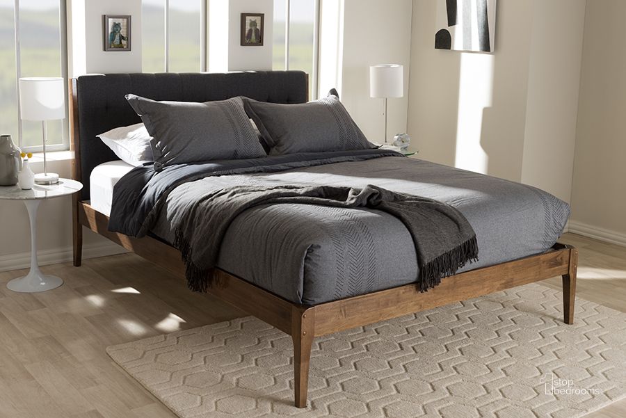 The appearance of Baxton Studio Clifford Mid-Century Dark Grey Fabric And Medium Brown Finish Wood Queen Size Platform Bed designed by Baxton Studio in the transitional interior design. This grey piece of furniture  was selected by 1StopBedrooms from Clifford Collection to add a touch of cosiness and style into your home. Sku: SW8065-Grey/Walnut-M7-Queen. Bed Type: Platform Bed. Material: Fabric. Product Type: Platform Bed. Bed Size: Queen. Image1