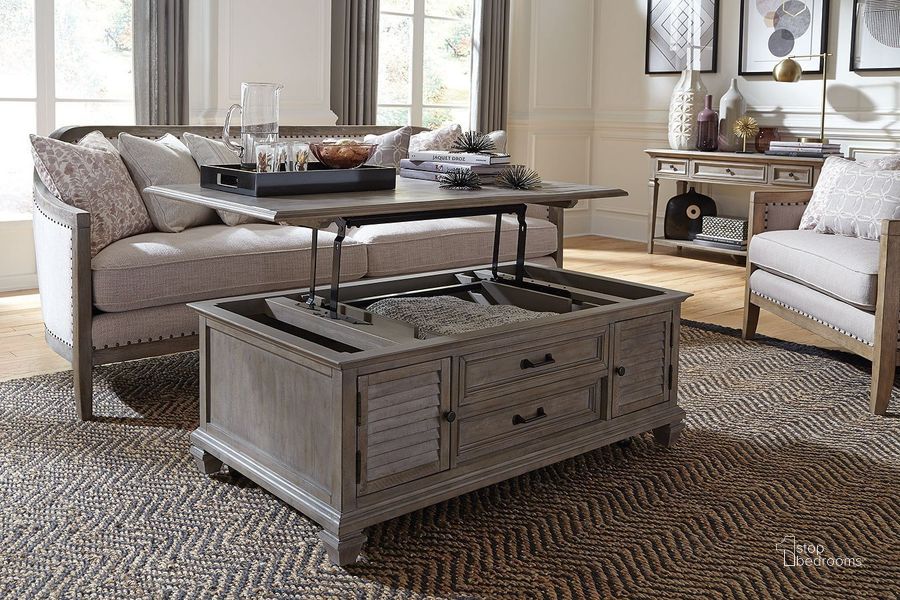The appearance of Lancaster Dovetail Grey Lift Top Storage Cocktail Table with Casters designed by Magnussen in the transitional interior design. This brown piece of furniture  was selected by 1StopBedrooms from Lancaster Collection to add a touch of cosiness and style into your home. Sku: T4352-50. Product Type: Cocktail Table. Material: Pine. Image1
