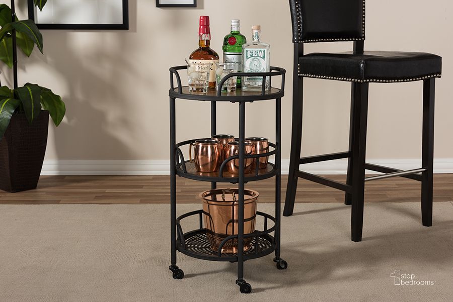 The appearance of Baxton Studio Bristol Rustic Industrial Style Metal And Wood Mobile Serving Cart designed by Baxton Studio in the rustic / southwestern interior design. This black piece of furniture  was selected by 1StopBedrooms from Bristol Collection to add a touch of cosiness and style into your home. Sku: YLX-9052. Material: Wood. Product Type: Kitchen Islands and Serving Cart. Image1