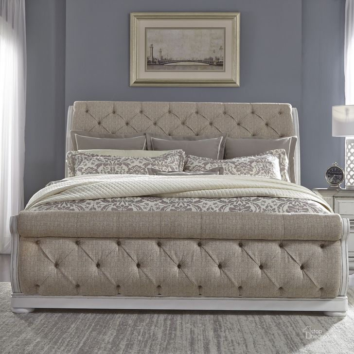 The appearance of Abbey Park Antique White King Upholstered Sleigh Bed designed by Liberty in the traditional interior design. This white piece of furniture  was selected by 1StopBedrooms from Abbey Park Collection to add a touch of cosiness and style into your home. Sku: 520-BR22FU;520-BR22HU;520-BR92. Bed Type: Sleigh Bed. Product Type: Sleigh Bed. Bed Size: King. Material: Rubberwood. Image1