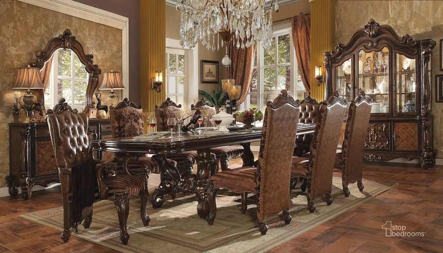 The appearance of Acme Versailles 9-Piece Pedestal Dining Set in Cherry Oak designed by ACME in the rustic / southwestern interior design. This brown piece of furniture  was selected by 1StopBedrooms from Versailles Collection to add a touch of cosiness and style into your home. Sku: 61100T;61101ST;61102;61103. Table Top Style: Wood w/extension. Material: Wood. Product Type: Dining Room Set. Table Top Shape: Rectangular. Image1