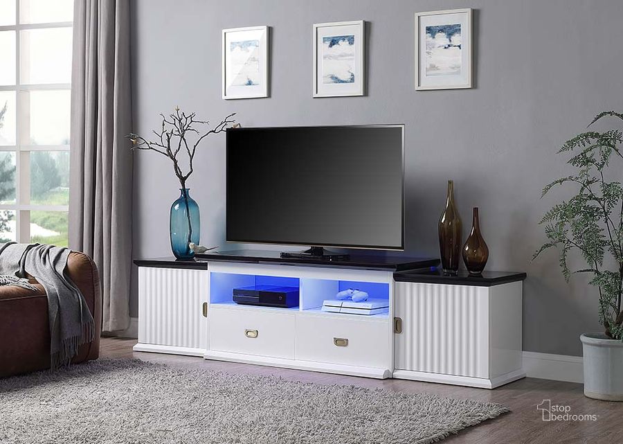 The appearance of Acme Barend TV Stand With Led In White And Black High Gloss Finish designed by ACME in the modern / contemporary interior design. This white and black piece of furniture  was selected by 1StopBedrooms from Barend Collection to add a touch of cosiness and style into your home. Sku: LV00999-1;LV00999-2. Material: Wood. Product Type: TV Stand. Image1