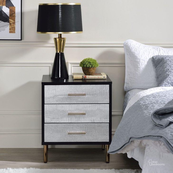The appearance of Acme Myles Nightstand In Silver And Gold Finish designed by ACME in the modern / contemporary interior design. This black piece of furniture  was selected by 1StopBedrooms from Myles Collection to add a touch of cosiness and style into your home. Sku: AC00842. Material: Metal. Product Type: Nightstand. Image1