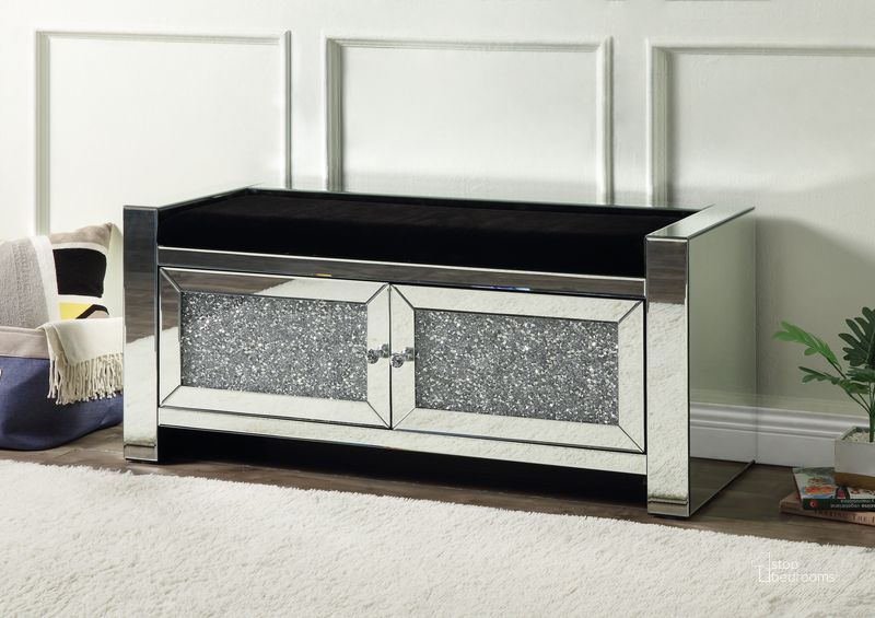 The appearance of Acme Noralie Bench With Storage In Mirrored And Faux Diamonds AC00540 designed by ACME in the glam interior design. This mirrored piece of furniture  was selected by 1StopBedrooms from Noralie Collection to add a touch of cosiness and style into your home. Sku: AC00540. Material: Wood. Product Type: Bench. Image1